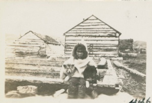 Image: Eskimo [Inuit] boy with pup